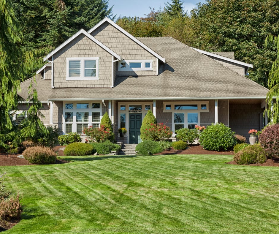 image of a house with a green lawn